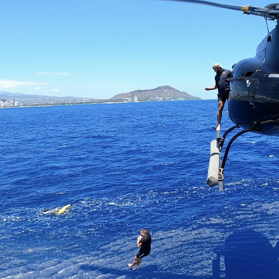 Saša Forić mid-helicopter jump with Navy SEALs in Hawaii, United States.